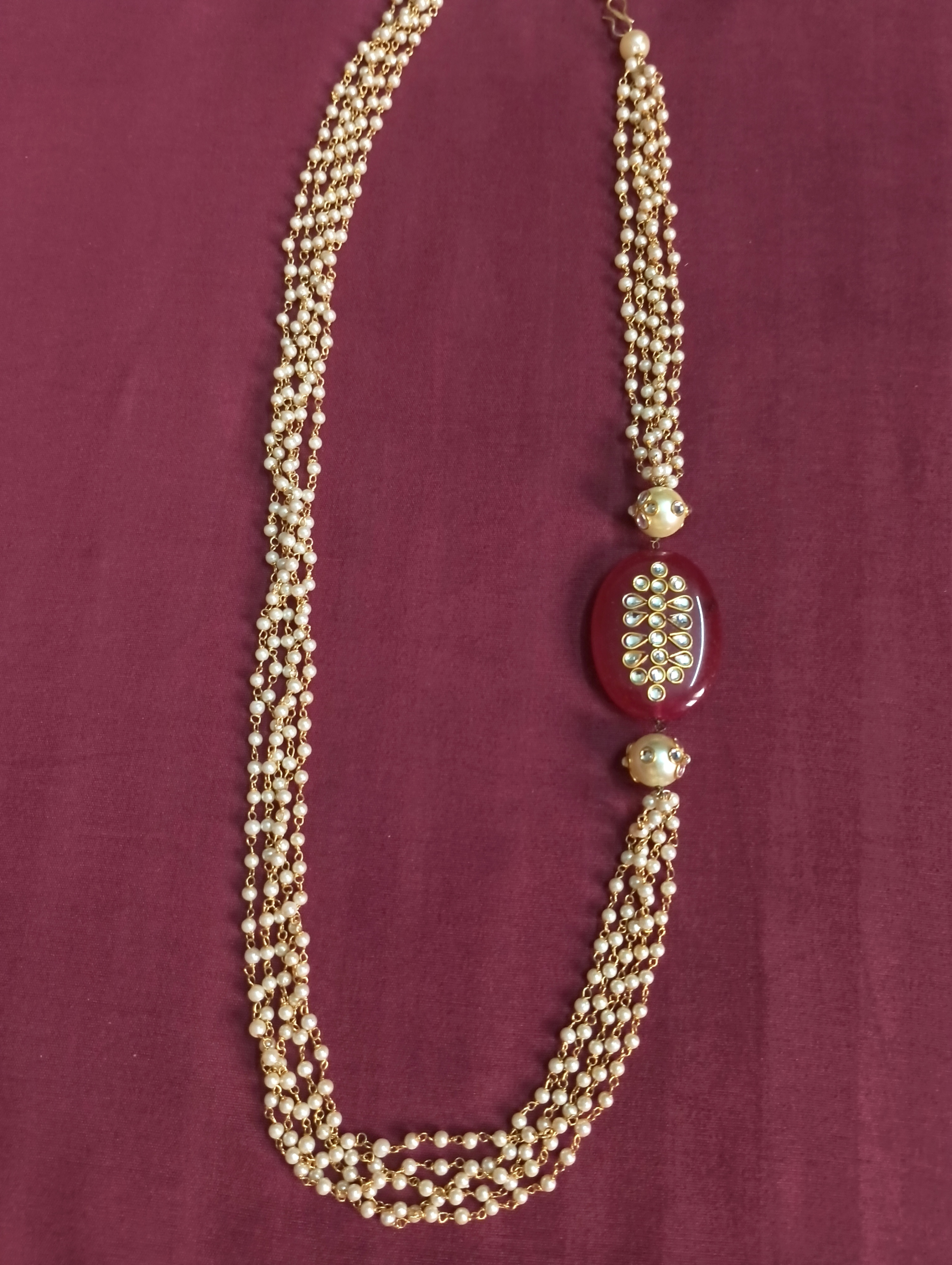 Multi-Strand Gold and Pearl Necklace With Magenta Side Pendant